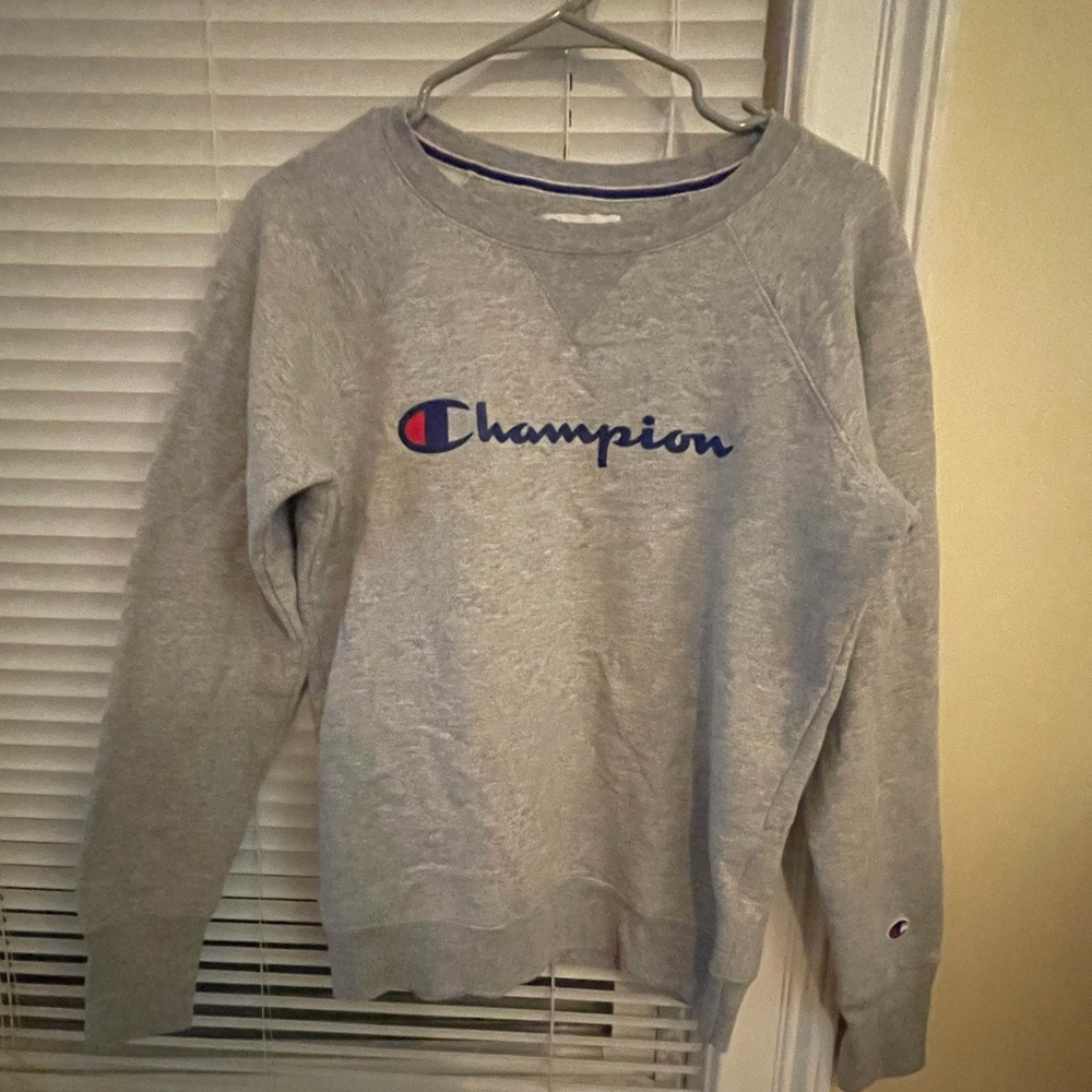 Size small gray Champion crew neck sweatshirt.  Lightly worn.
